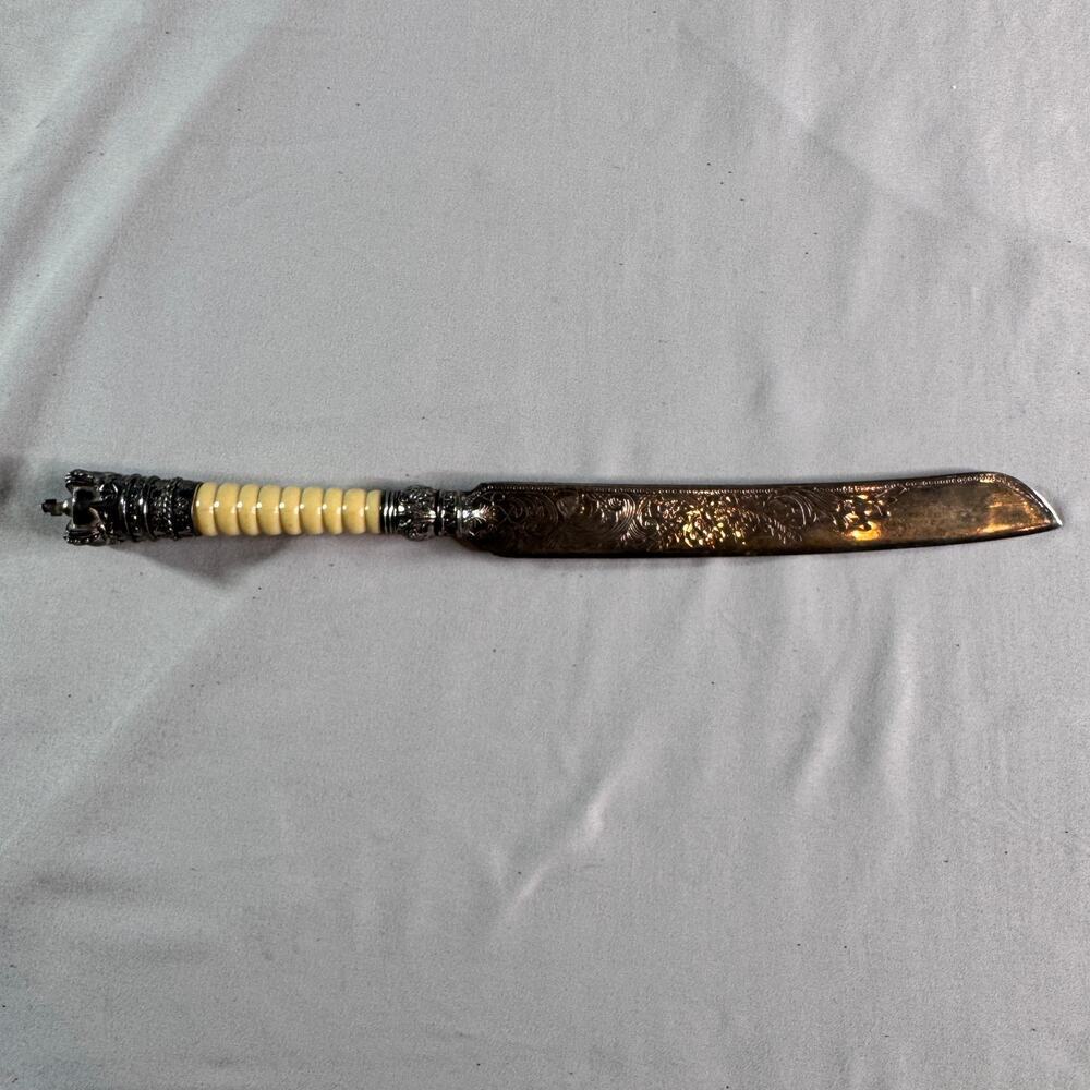 Vintage Ornate Cake Server Knife Etched Blade Crown Handle Faux Ivory 12”